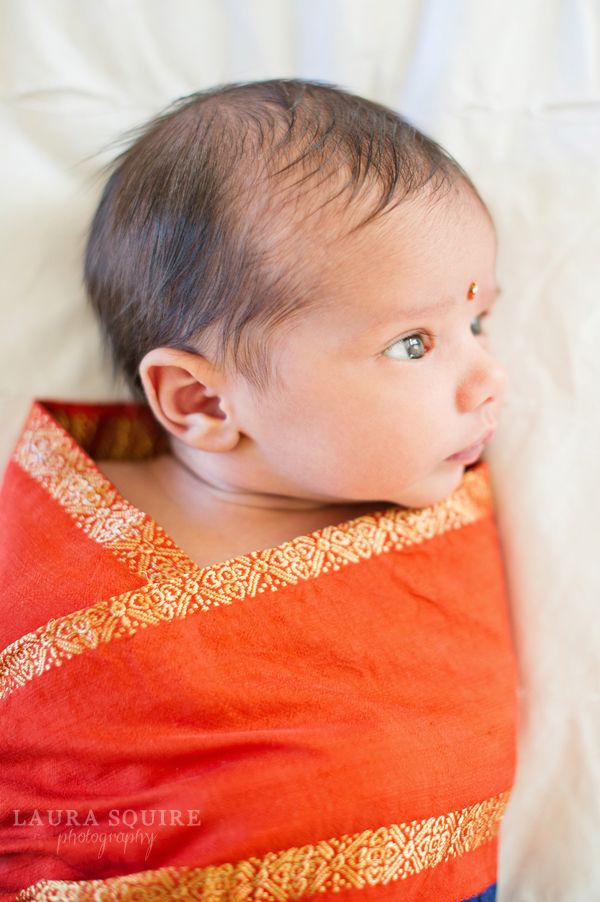 Indian baby wrapped in a Sari