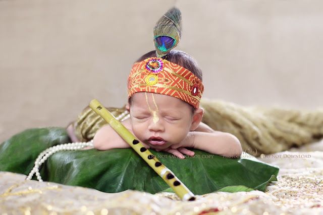 Baby as Bal Krishna with flute