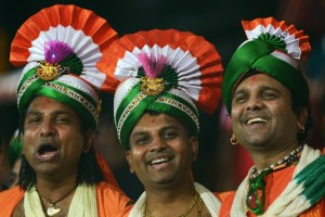 Jovial fans sporting a tri-colored turbans